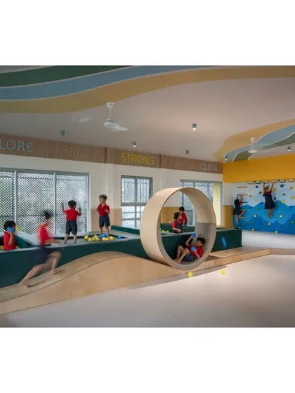 We believe play is serious learning. This soft-gym is designed for exploration and energy, with custom-built structures like a rolling wheel and climbing wall that encourage kids to be strong, quick, and adventurous. The dynamic design and vibrant colors create a space where children can truly thrive.