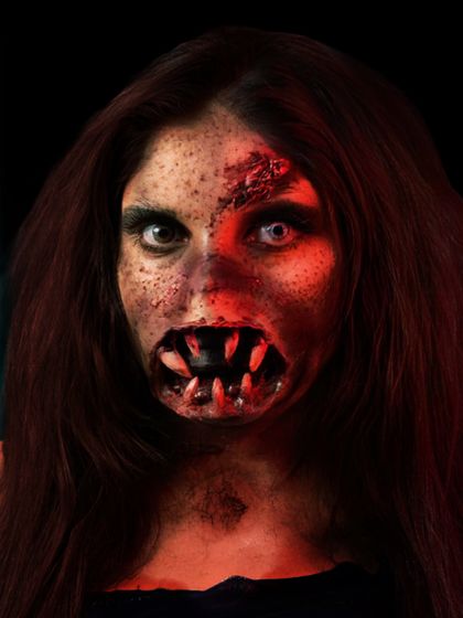 A terrifying zombie look with prosthetic teeth, created by one of our talented students. Our SFX course covers the creation and application of simple prosthetics.