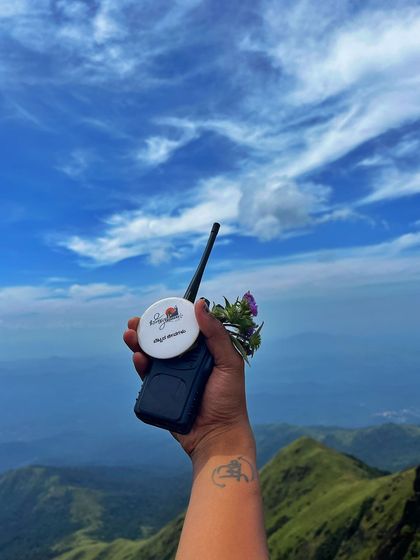 Our trek leads use walkie-talkies to ensure the group stays connected and safe, especially on vast and challenging trails like Kumara Parvatha where there is no mobile network.