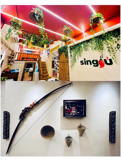 When you step into Singju, I want you to feel like you've been transported to the Northeast. The decor is a collection of memories and heritage, from the traditional bow and arrow on the wall to the bamboo accents. This collage shows how we've built a space that is not just a restaurant, but a true cultural experience.