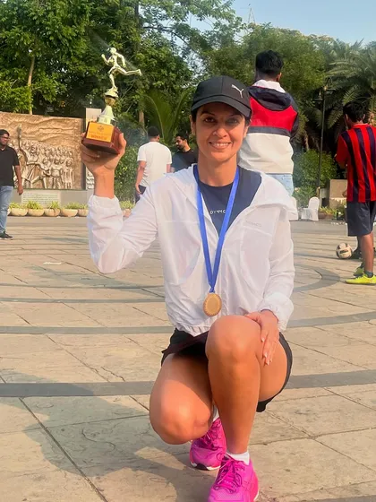This is what it's all about. The smile of a runner who has pushed her limits and achieved her goal. I am privileged to witness these moments of triumph, whether it's a podium finish or a new personal best.