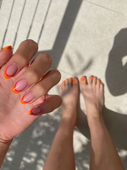 Another matching set, this time with a double French tip in orange and red.