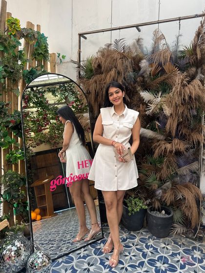 A confident pose in the white dress. This is the kind of simple, classic, and reusable piece I love finding for my clients' wardrobes.