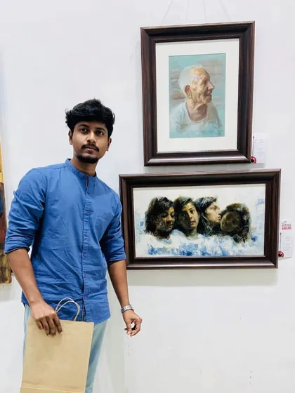 Standing with my two award-winning paintings at The Art Society of India exhibition.