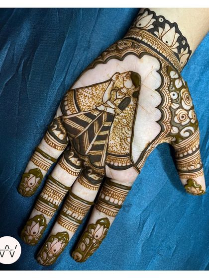 A beautiful design featuring a bride in a doli (palanquin). This narrative style of henna is perfect for telling the story of your wedding day.