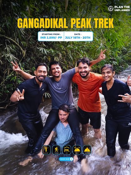 A group of friends having fun in a stream during the Gangadikal Peak trek.