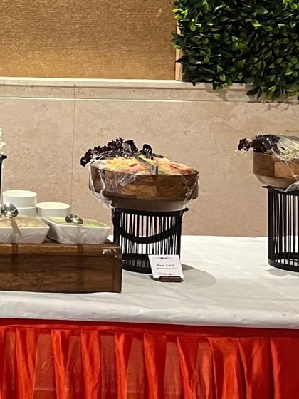 A salad bar setup for a chaat-themed event. Fresh salads provide a light and healthy counterpoint to the rich and flavorful chaat dishes.