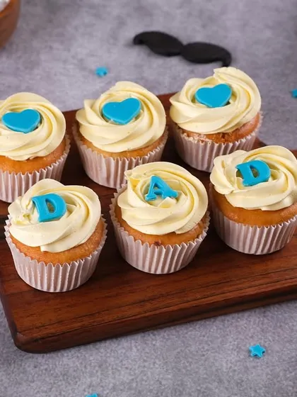 A box of "DAD" cupcakes for Father's Day. It's a simple and sweet way to show your appreciation for everything he does.