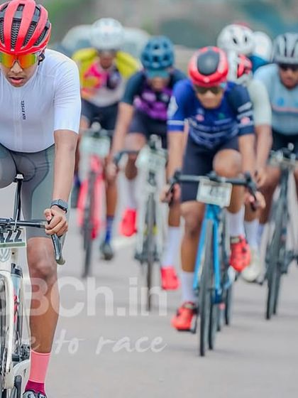A rider leads the charge, breaking away from the peloton. It takes immense power and courage to attempt a solo move in a long road race.