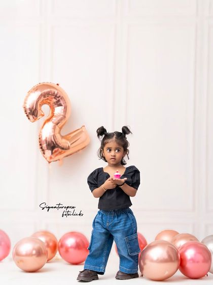 A quiet moment with a cupcake. Even the small, thoughtful moments of a birthday celebration are worth capturing forever.