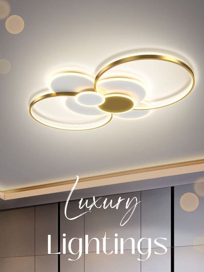 A simple yet elegant ceiling light with overlapping rings in a gold finish. This flush-mount fixture is perfect for adding a touch of modern luxury to a bedroom or hallway without taking up too much vertical space.