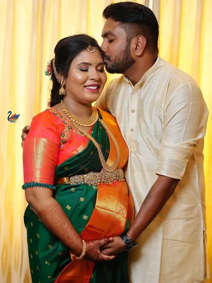 A gentle kiss on the forehead is a simple but powerful expression of love. I captured this intimate moment between the couple during their baby shower event.