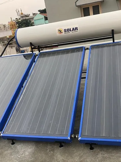 This is our standard 300-liter FPC solar water heater, fully installed on a residential rooftop. The system includes three collector panels with a durable blue frame and an insulated storage tank, making it an ideal energy-efficient solution for families.
