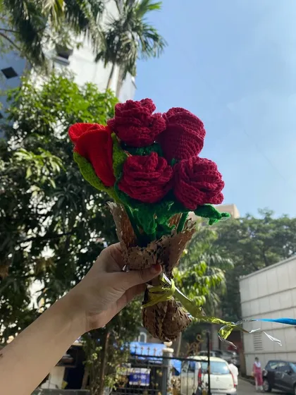 A beautiful handmade bouquet of red roses, perfect for your loved ones. This is a classic Valentine's gift that will never wilt.