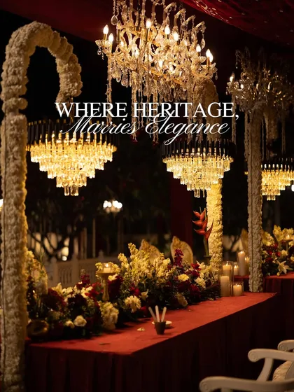 An image capturing the essence of a heritage wedding, with the words "Where Heritage, Marries Elegance" overlaid on a beautifully decorated dining setup.