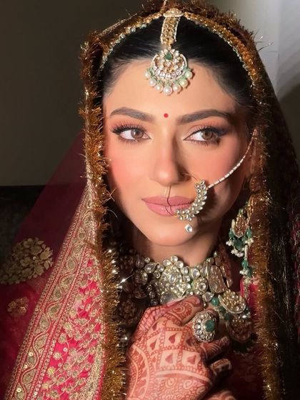 Looking like an absolute dream for her big day. My beautiful bride Sugandh in a classic Sabyasachi ensemble with soft, glowing makeup.