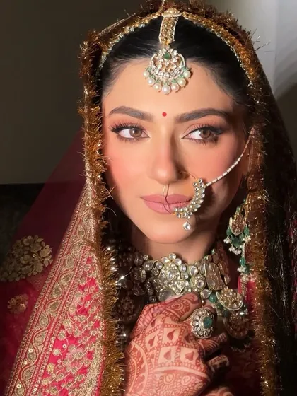 Looking like an absolute dream for her big day. My beautiful bride Sugandh in a classic Sabyasachi ensemble with soft, glowing makeup.