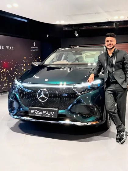 Posing with the stunning Mercedes-Benz EQS SUV. Performing for a brand synonymous with luxury and performance is always a thrill, and this was one of 14 incredible shows I've done with them.