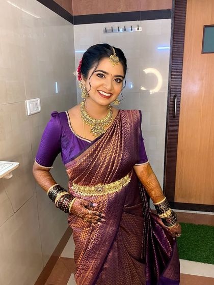 A full portrait of the bride in our antique kemp jewellery. You can see how the choker, long necklace, and waist belt work together to create a cohesive and photograph ready look for her big day.
