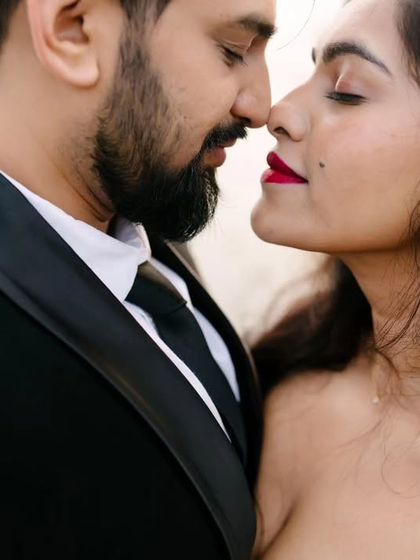 An intensely close and romantic moment. This shot captures the anticipation and intimacy just before a kiss, making it a powerful and emotional photograph.