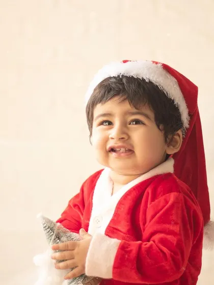 A little Santa Claus with the sweetest expression. My Christmas mini-sessions are perfect for creating holiday cards and memories.