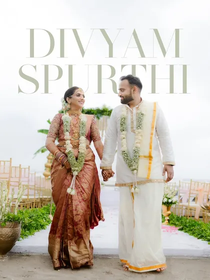 A beautiful portrait of the couple walking hand-in-hand after their South Indian wedding ceremony, with the ocean in the background.