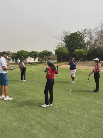 A putting session during the Junior Asian Golf Academy summer camp.