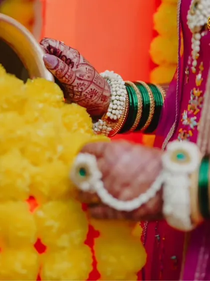 A symbolic and beautiful shot from the baby shower ceremony. The bride's hands, adorned with my floral bracelets, are part of the traditional rituals.