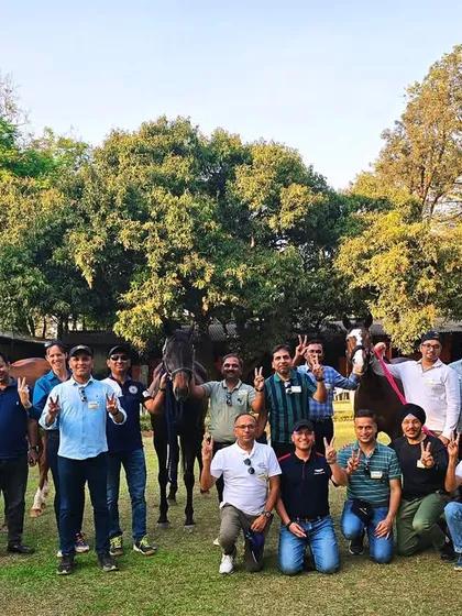 Senior partners from a top consulting firm gather for a group photo during their leadership program. Our serene, green environment provides the perfect backdrop for team bonding and reflection.