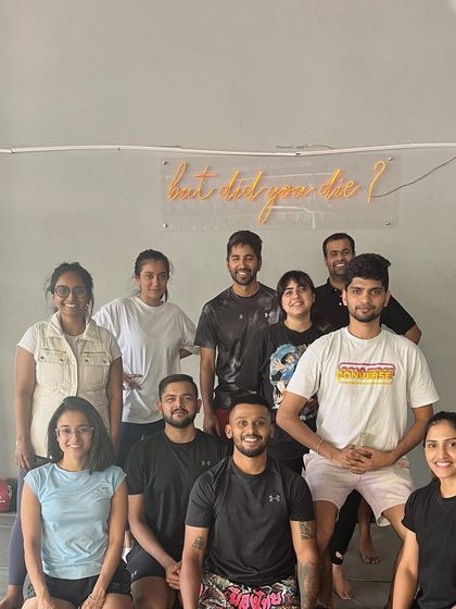 The Saturday crew, all smiles after a great class. The "but did you die?" sign in the back says it all.