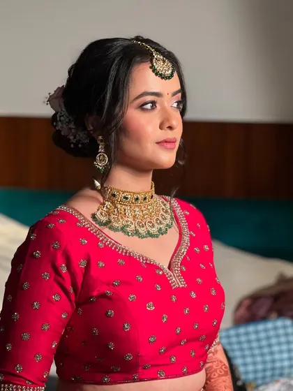 A beautiful portrait of Neha before the ceremony, her makeup looking fresh and radiant.