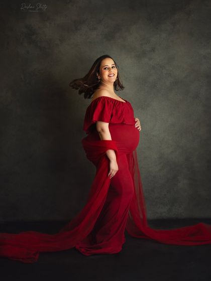 A simple hair flip can add so much life and energy to a photo. This shot captures a moment of joy and confidence, showcasing the beautiful movement of the gown.