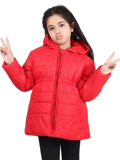 A playful shot of a child model in a bright red puffer jacket, perfect for kids' wear e-commerce listings. My studio is equipped to handle shoots for all age demographics.