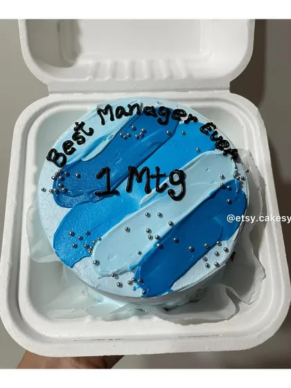 A bento cake to appreciate a colleague, with 'Best Manager Ever' written on a blue brushstroke background.