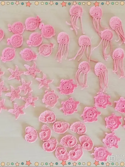 This is an example of a bulk order I completed for a children's clothing brand. It features a collection of sea-themed appliqués, including jellyfish, starfish, and shells, all in a consistent color for their new line. I love collaborating with boutiques on custom designs.