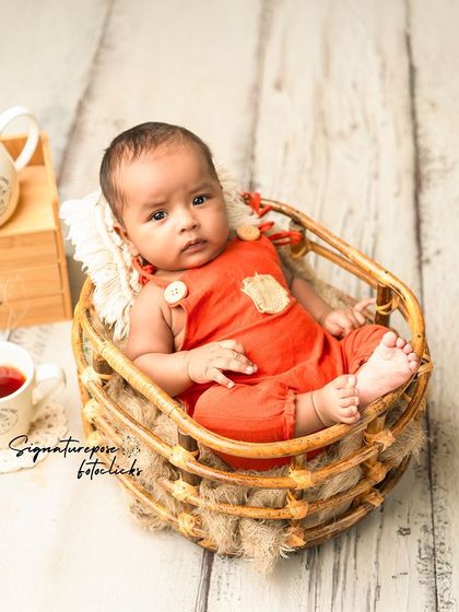 A duplicate of image 103, a curious and charming portrait of a three-month-old.