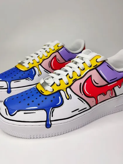 A full view of a pair of the drip custom AF1s. This design is all about having fun with colour and shape.