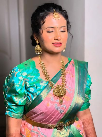 A shot with eyes closed to show the soft, shimmery eyeshadow.