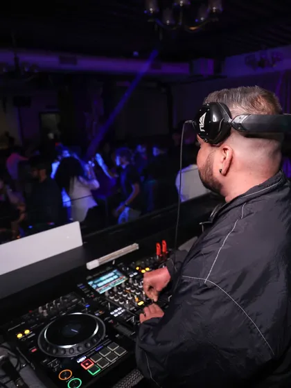 A view from behind the decks, looking out at the packed dancefloor at Tales of Tavern.