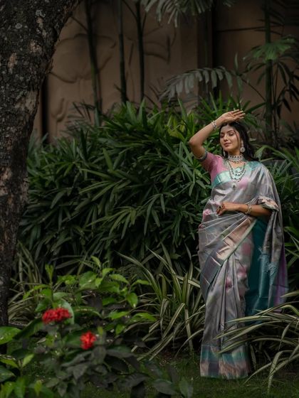 A final shot from this series, capturing the full beauty and unique color play of this Kancheevaram silk masterpiece.