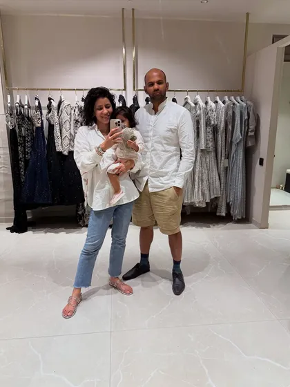 A family mirror selfie where our different styling personalities are matching in white. It's a candid look at my life and how fashion is part of our everyday.