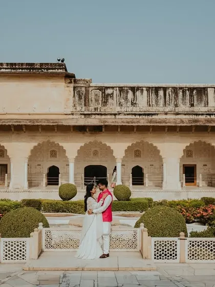 A truly royal pre-wedding portrait at Amer Fort in Jaipur. We frame our couples against the grand scale of heritage architecture to create powerful, regal images that feel like a scene from a historical romance.