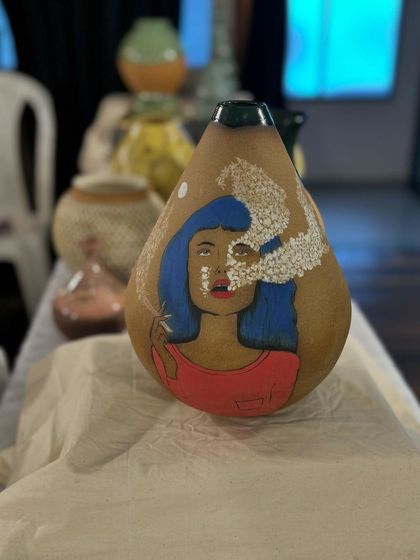 A few of my favorite finished vases from a recent collection, featuring a variety of glazes, painted details, and forms. Each one has its own personality.