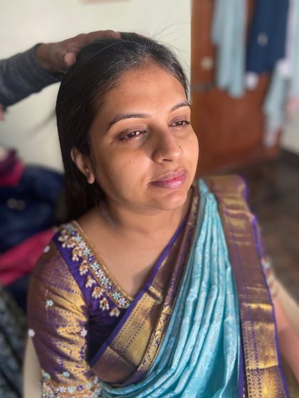 A behind-the-scenes moment before the transformation. It's always an honor to be part of such a special journey.