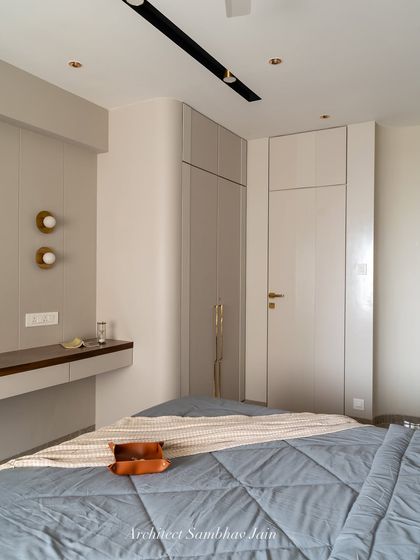 A calming palette of soft greys and taupes brought to life with clean lines and a touch of gold. PU-finished wardrobes with concealed handles maintain the sleek look, while the subtle curves and detailing add warmth and depth to the space.