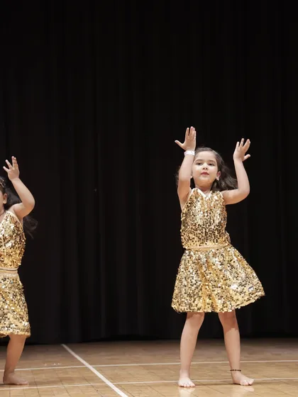 Two of our little stars dancing in sync. Teamwork and group coordination are key skills we introduce even in our youngest dance batches.