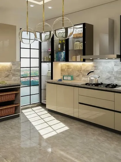 This perspective of the kitchen showcases the ample storage and natural light from a large window. The combination of glossy beige cabinets, a marble-effect backsplash, and modern pendant lights creates a bright and contemporary cooking space.