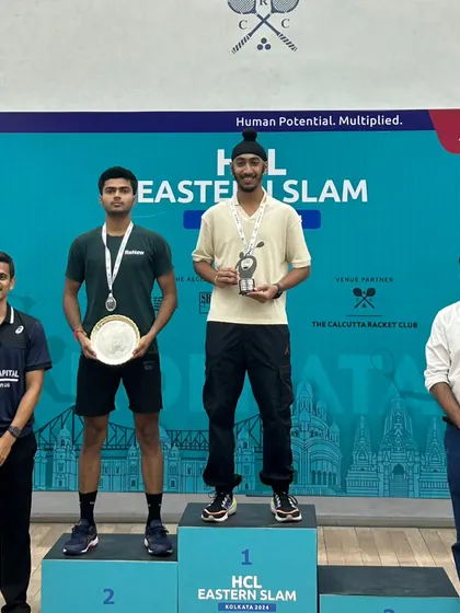This is what we work for. One of my players on the podium at the HCL Eastern Slam in Kolkata, with me right there beside him. We don't just coach; we build champions and celebrate their success together.