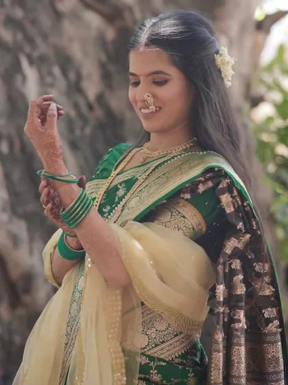 A beautiful candid shot of the bride. Her natural, glowing makeup looks perfect in the daylight.