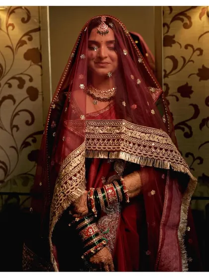 When Maharani meets contemporary. This veiled shot of Samruddhi is dramatic and beautiful, showcasing the versatility of her bridal look.